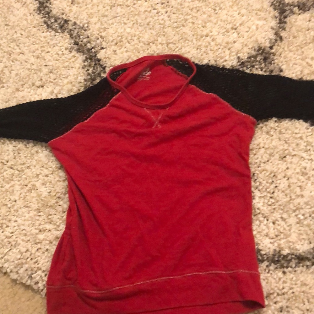 A fishnet red shirt.